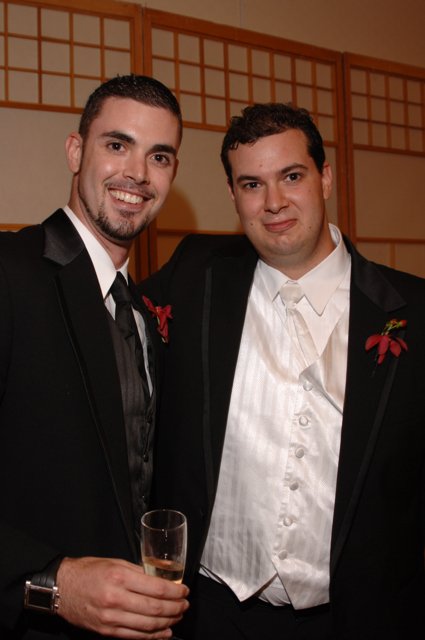 Two Dapper Men at a Wedding Reception