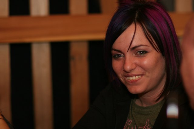 Purple-haired Lady Grinning with Joy