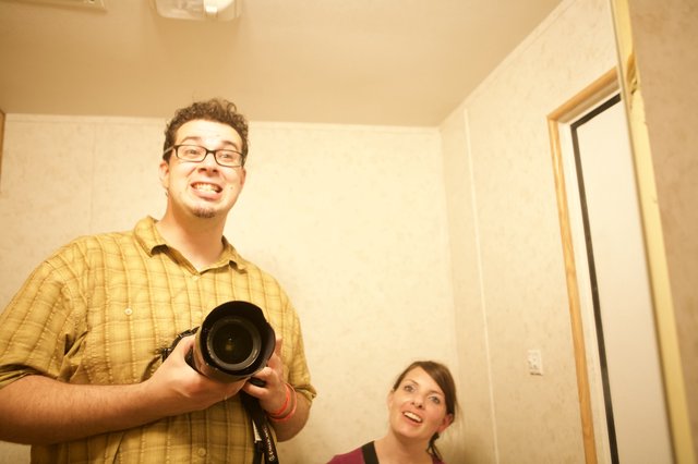 Dave and Penelope Laugh With Camera in Hand