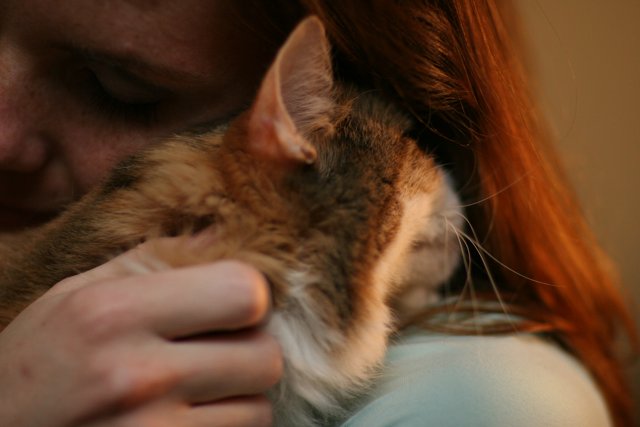 A Woman and her Abyssinian Cat