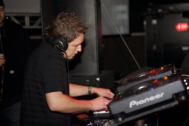 Adam F Jamming on His DJ Mixer