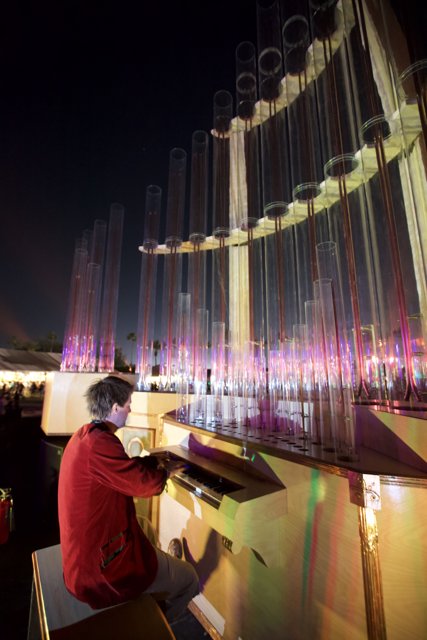 Organ Player in Front of Hanukkah Menorah