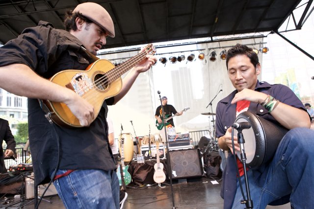 Ozomatli Music Band Performing on Stage