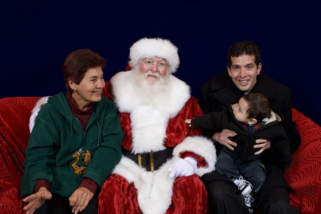 Festive family photo with Santa Claus