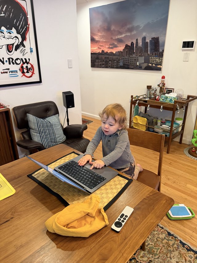 Toddler Working from Home at Wooden Desk