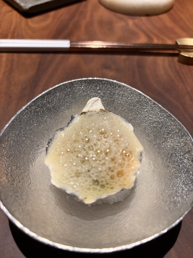 Delicate White Fish Sashimi on Artisan Ceramic Bowl
