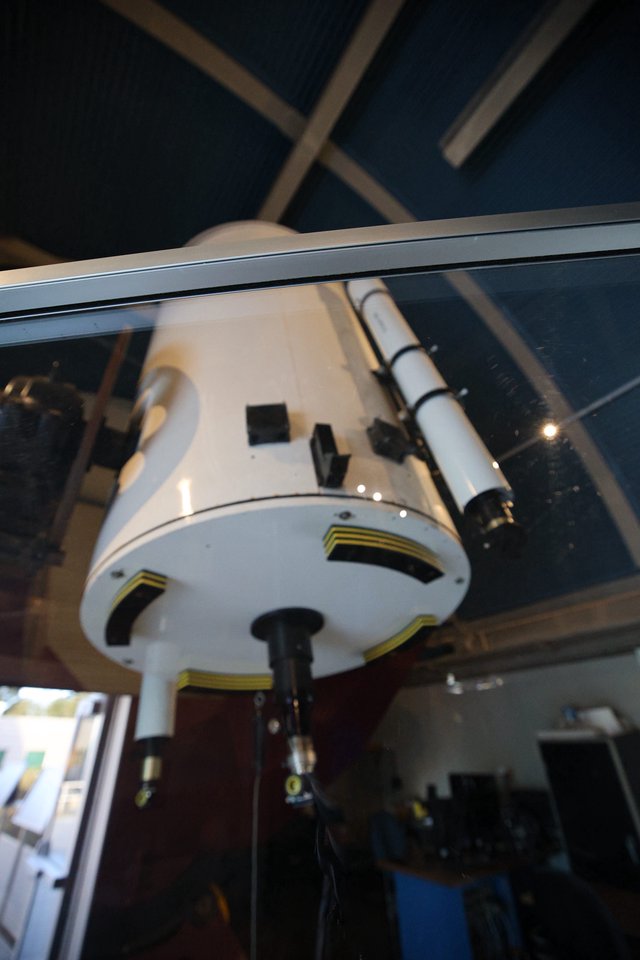 White Telescope Mount Under Observatory Dome