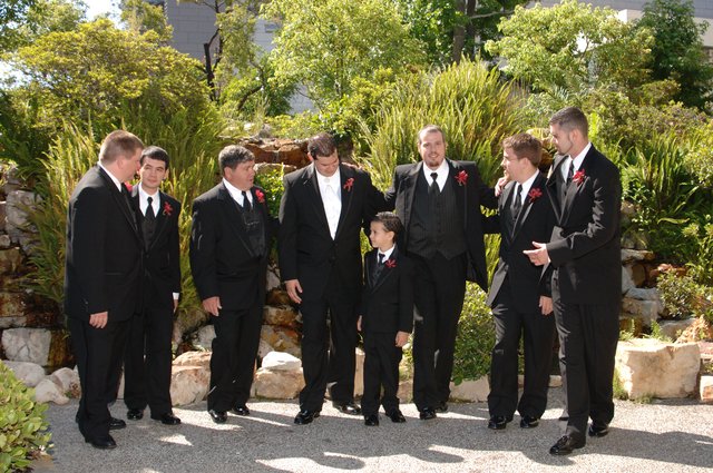 Groomsmen Share a Moment Before the Wedding Ceremony