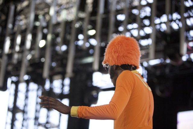 Orange Cap Man on Stage