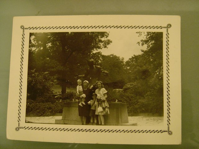 Family Portrait in Front of Statue