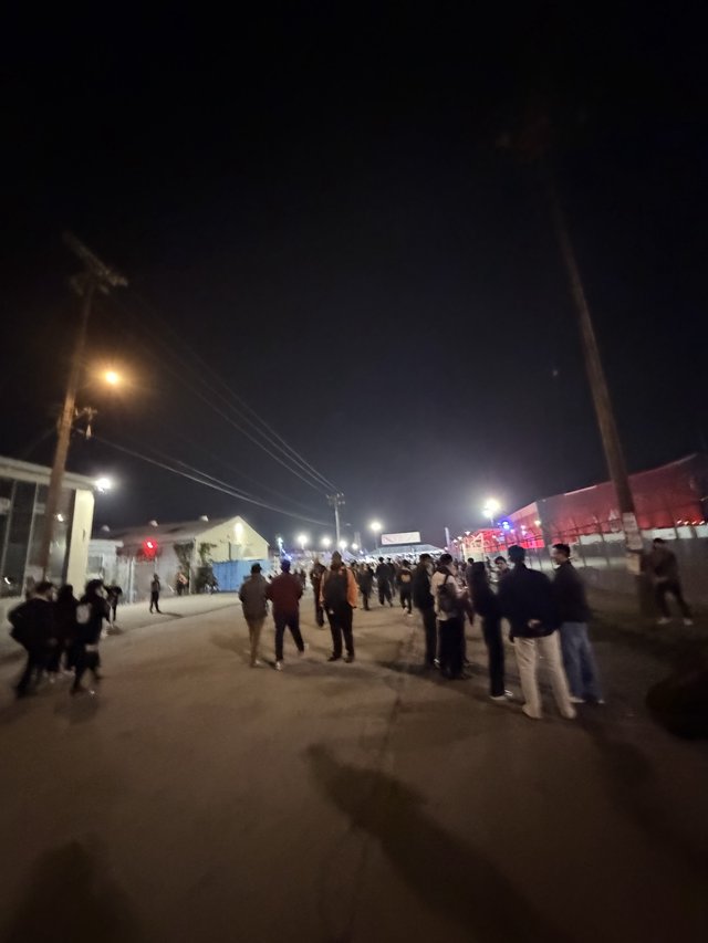Night Crowd Gathering at Outdoor Event Venue