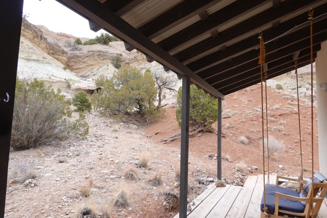 Panoramic porch view of a rocky canyon