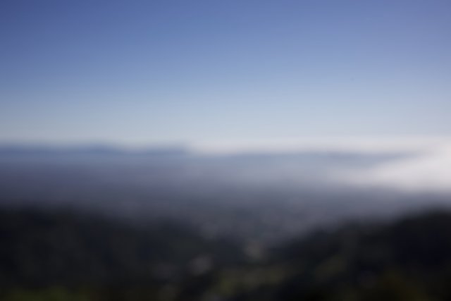 Misty Horizons: An Abstract Mountain View