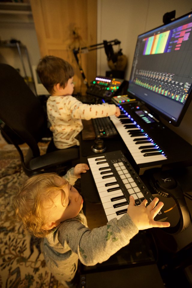 Young Children Making Music Together in Home Studio