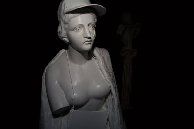 A Dignified Statue in a Hat