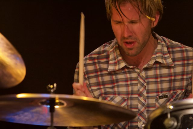 Brooks Wackerman rocking the stage with his drums