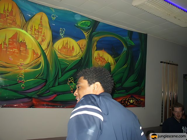 Man admiring the lively mural