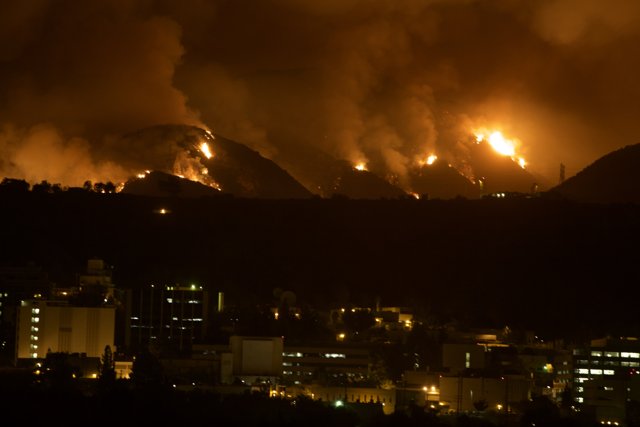 Blazing Mountains: Nighttime Fire in the City