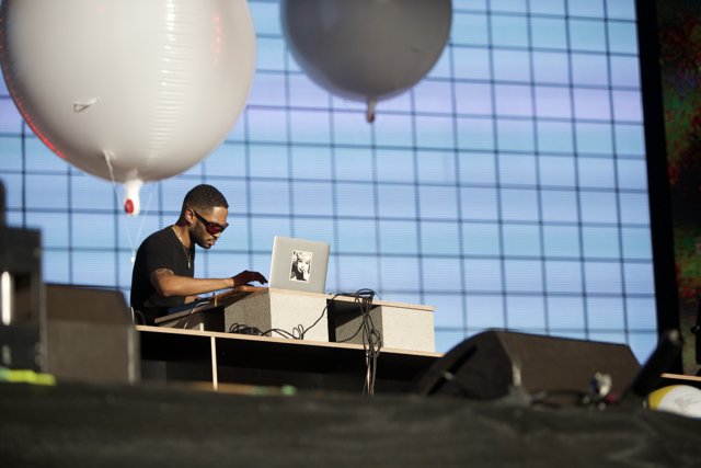 Laptop Performance with Balloon Backdrop