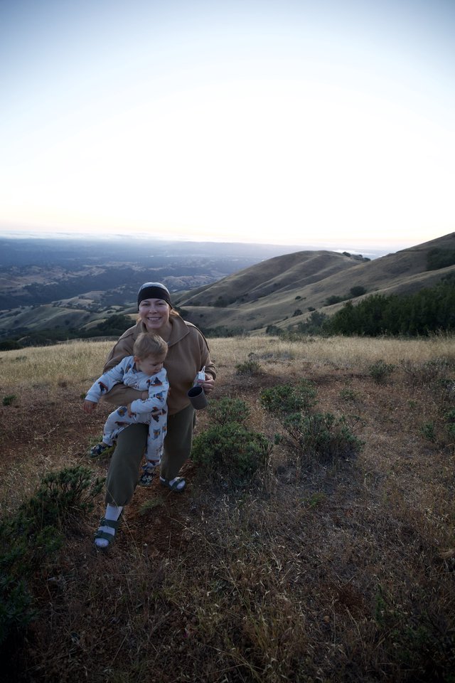 Mother and Toddler Hiking Golden Hills at Dusk