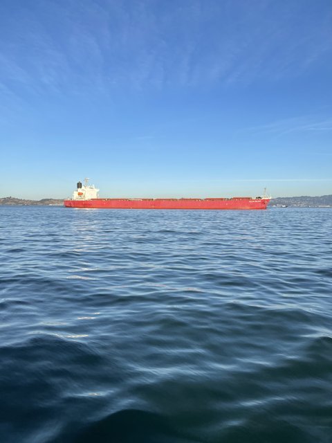 Red Freighter on the Horizon