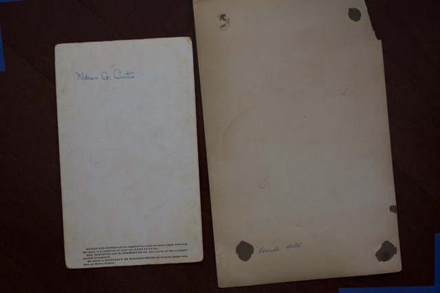 Handwritten Document on Blue Paper