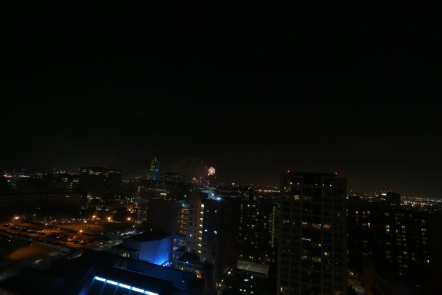 Cityscape Illuminated by Fireworks