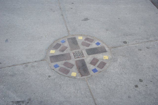 Cross on Manhole Cover