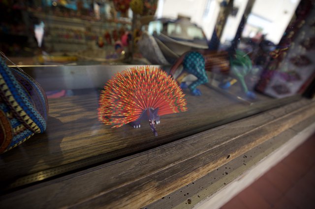 Vibrant Handcrafted Peacock Sculpture in Santa Fe Display
