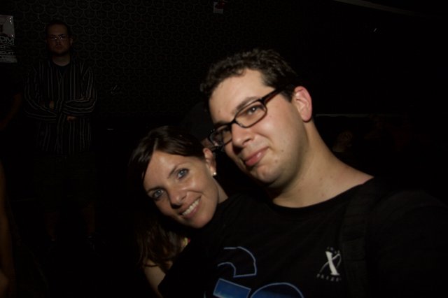 Dave and Penelope Smiling at a Nightclub Event