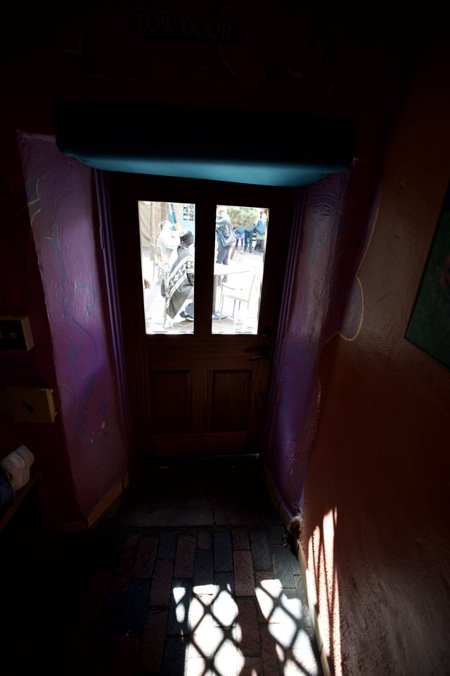 Vibrant Purple Entryway with Turquoise Ceiling in Santa Fe