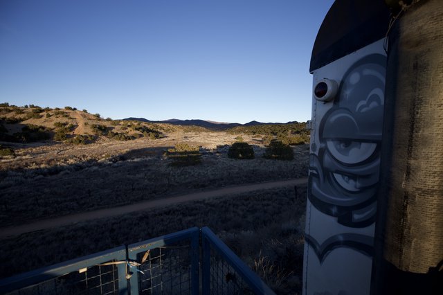 Desert Surveillance: Camera Installation at Golden Hour