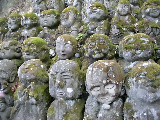 Moss-Covered Stone Statues at Kyoto City Hall