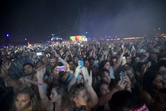 Hands Up for the Night Sky at Coachella
