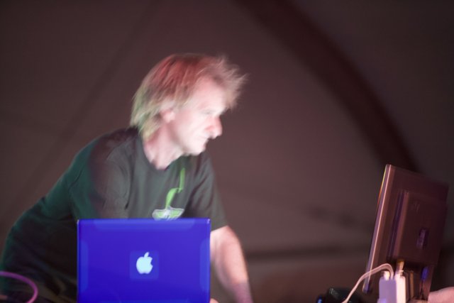 Man Works on Laptop at Coachella 2009