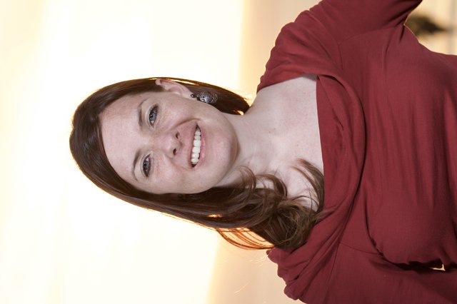 Smiling Woman in Red at Golden Hour