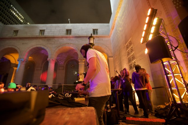 Nighttime DJ Set in Urban Architecture