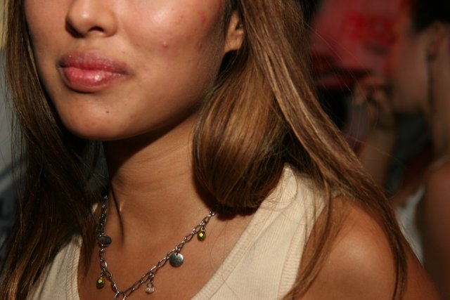 Brown-Haired Woman with a Stunning Necklace