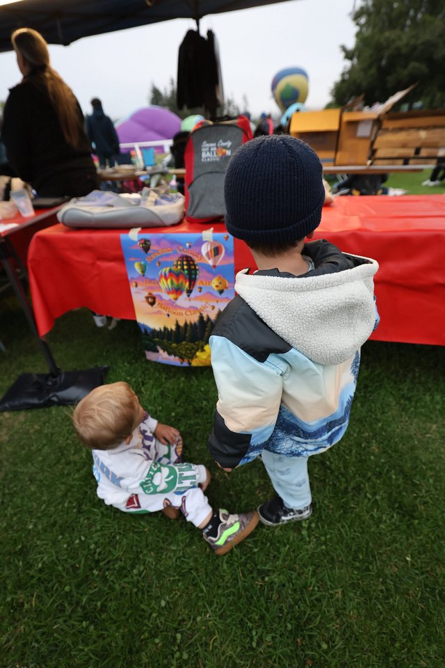 Young Children Marvel at Hot Air Balloon Festival