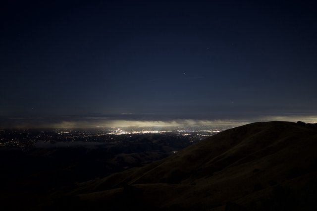 City Lights Glowing Beneath Clouds from Mount Diablo
