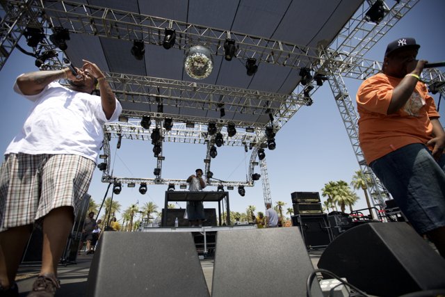 Two Men Performing on Stage at Coachella Music Festival