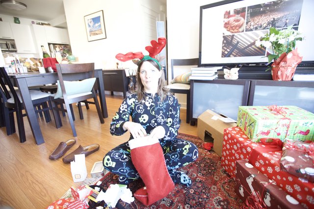 Christmas Morning Stocking Surprise in Festive Pajamas