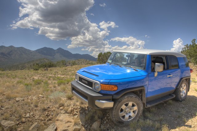 Blue Toyota FJ Cruiser on a Dirt Road Adventure