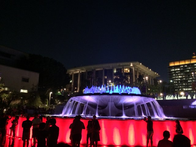 Red-Lit Fountain Gathering