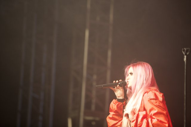 Pink-haired Woman Rocks the Stage