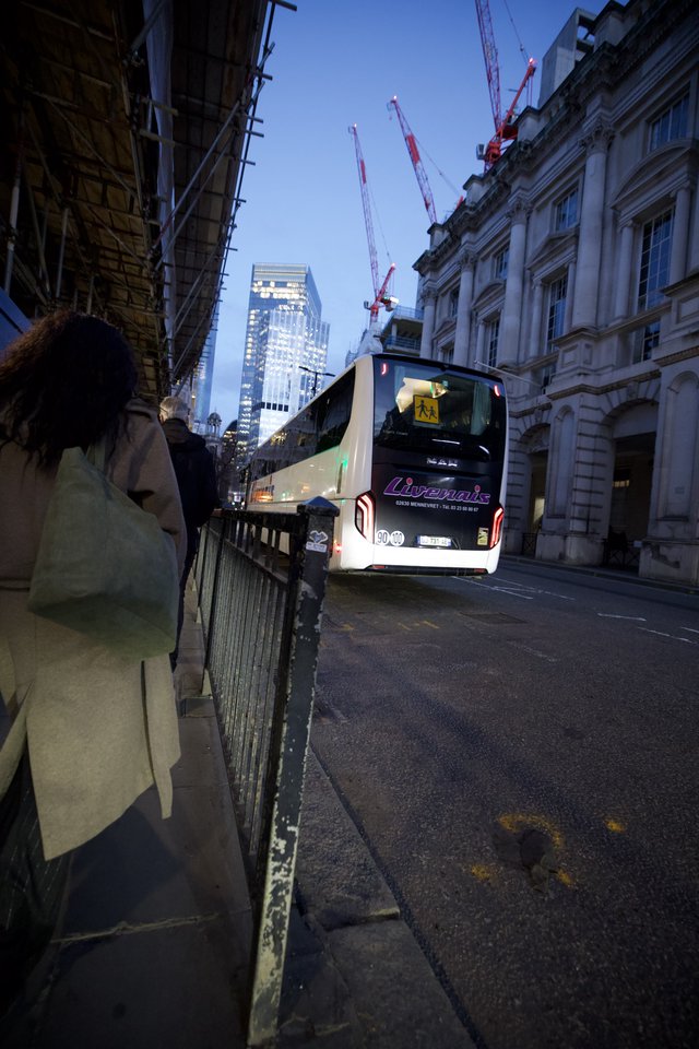 Evening Bus on London City Street at Dusk