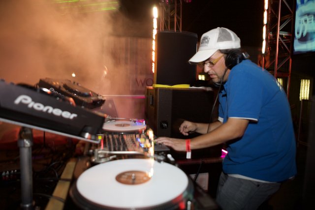 DJ Robin Schulz Spins Music in a Blue Hat
