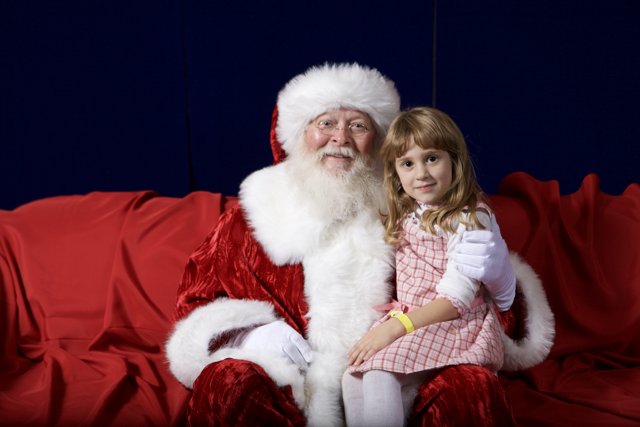 Little Girl Visits Santa Claus