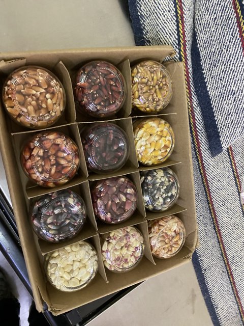 Assorted Beans and Nuts in a Cardboard Box