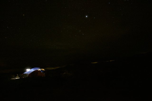 Mountain Tent under Starry Night Sky